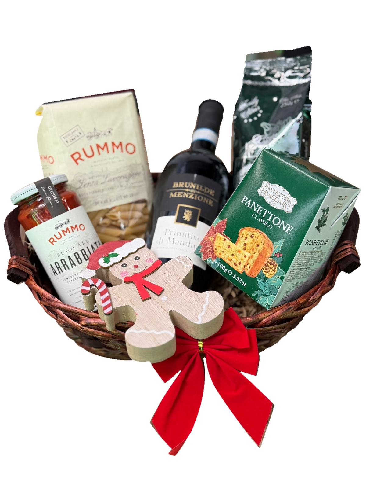 Coșul SELECTED Festive: vin Primitivo, paste, sos, cafea și panettone, cu omuleț decorativ și fundă roșie.